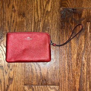 BRAND NEW coach wristlet red.